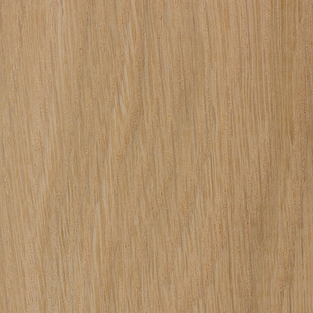 Close-up of a wooden surface with a light brown color and visible grain pattern.