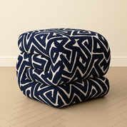 Bold C-Shaped Black & White Ottoman – Graphic Modern Pouf
