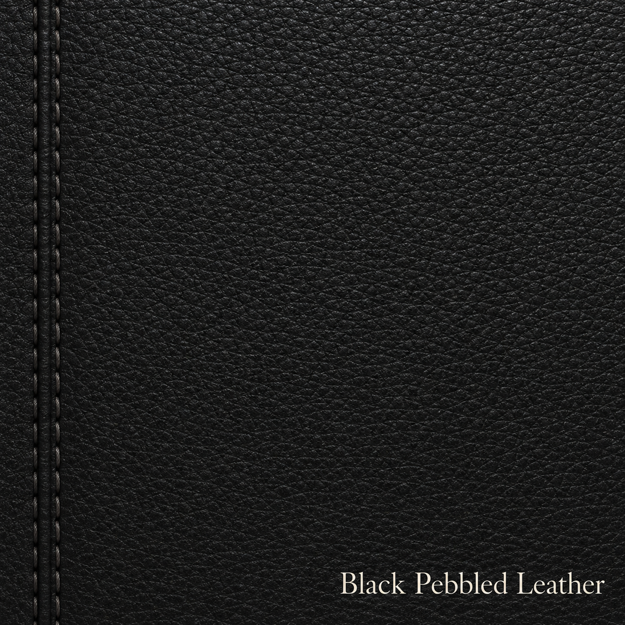 Close-up of black pebbled leather with stitching detail
