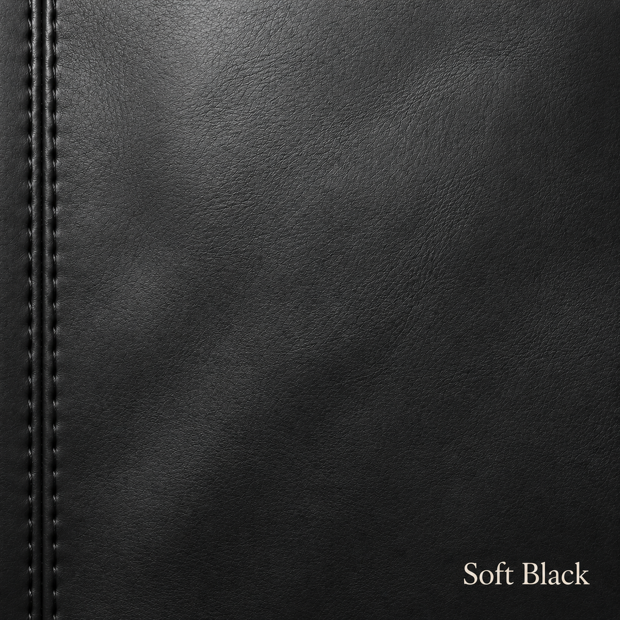 Close-up of soft black leather with stitching detail