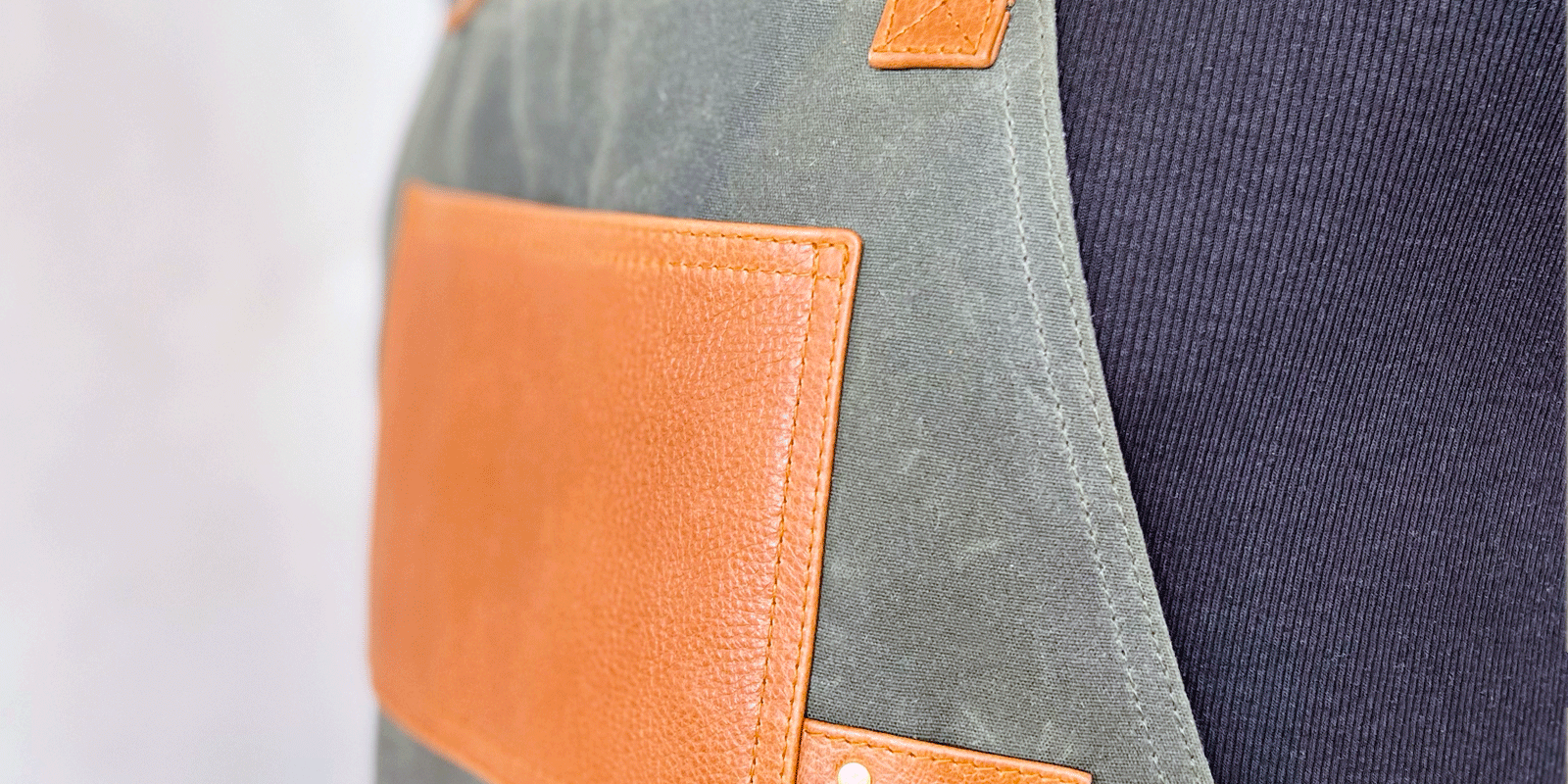 brown-leather-apron-with-khaki-wax-canvas-and-brass-detail