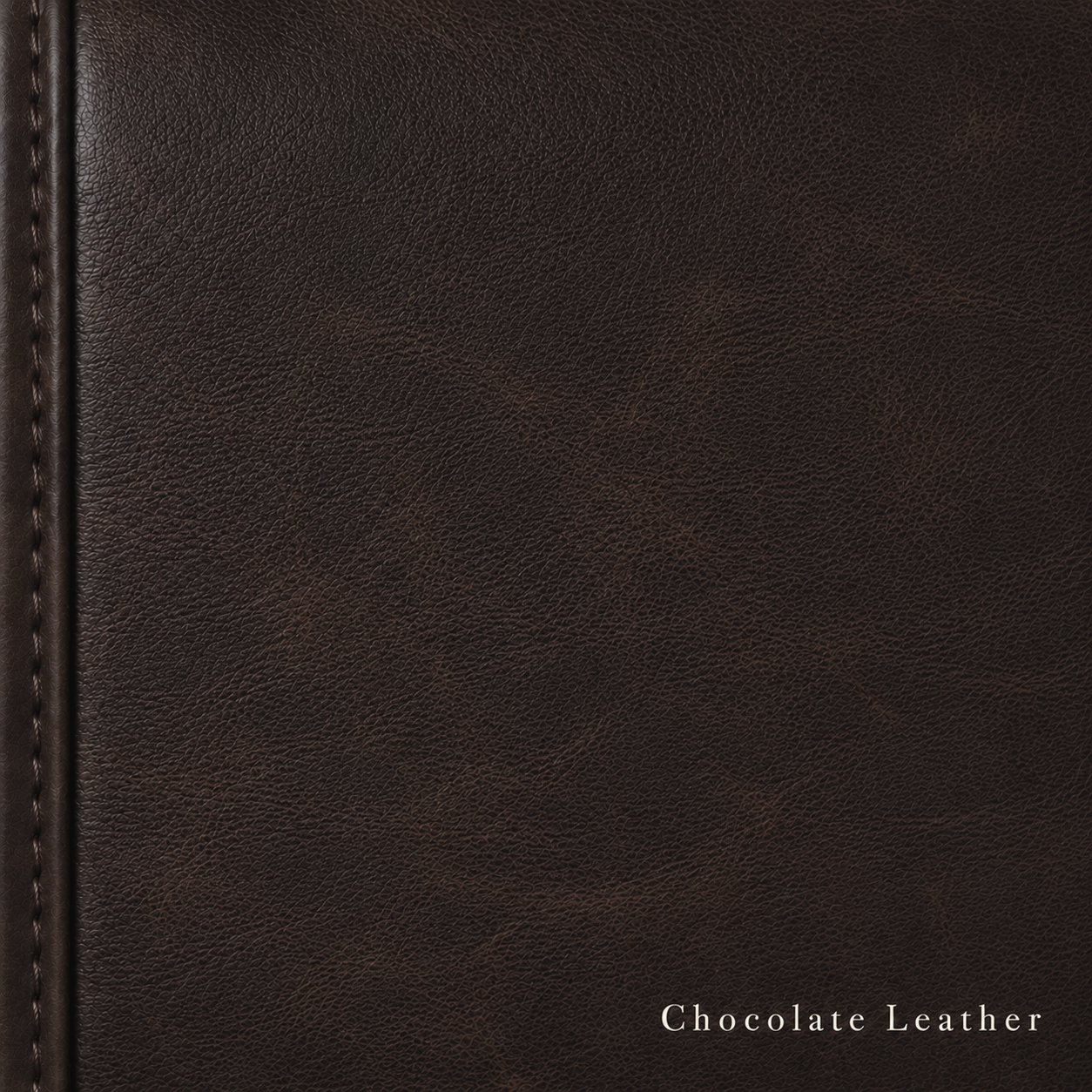 Close-up of chocolate brown leather with visible stitching