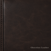 Close-up of chocolate brown leather with visible stitching