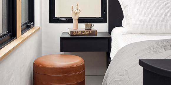 black-leather-paneled-round-ottoman-modern-hf-studio
