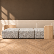 Custom modular sofa with solid white oak corners and patterned upholstery
