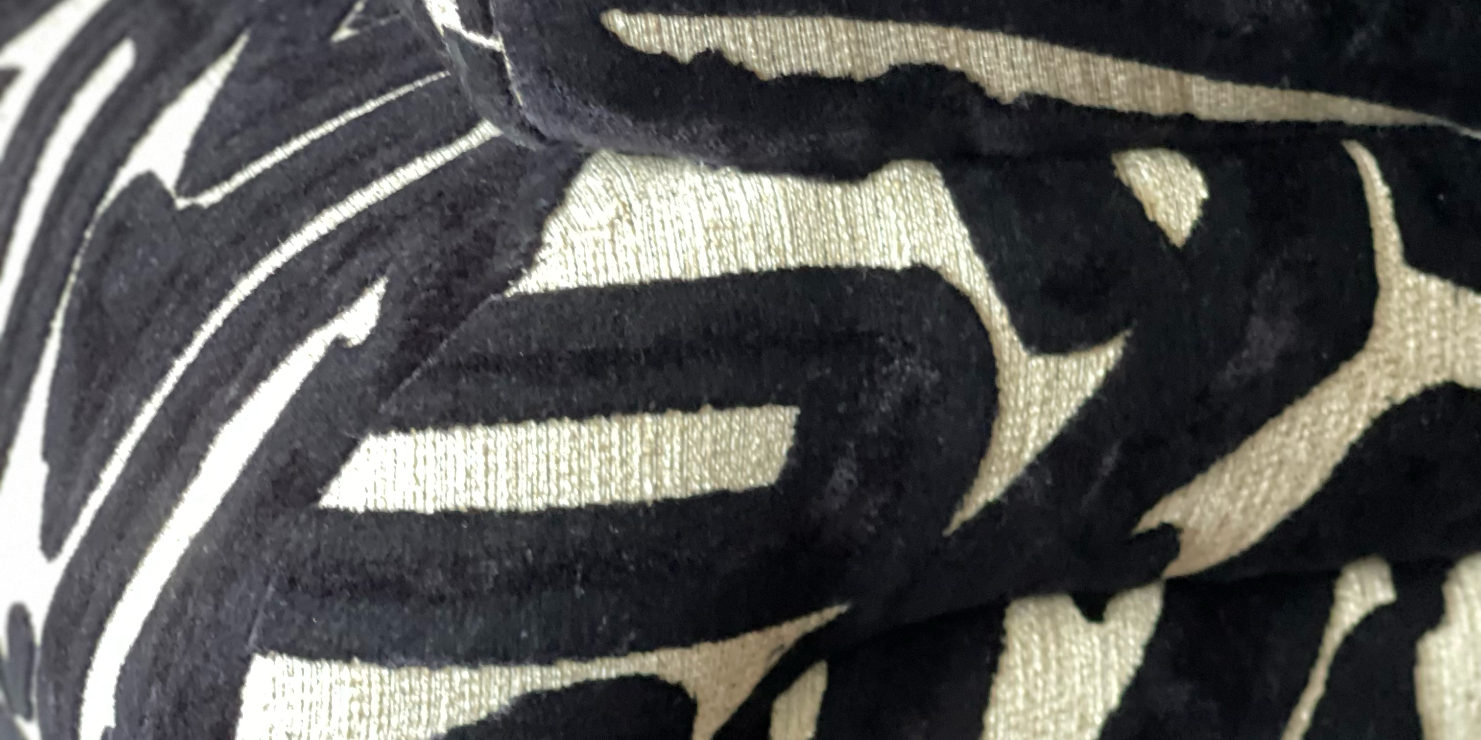 foot-stool-close-up-of-black-and-white-geometric_-ttoman.png