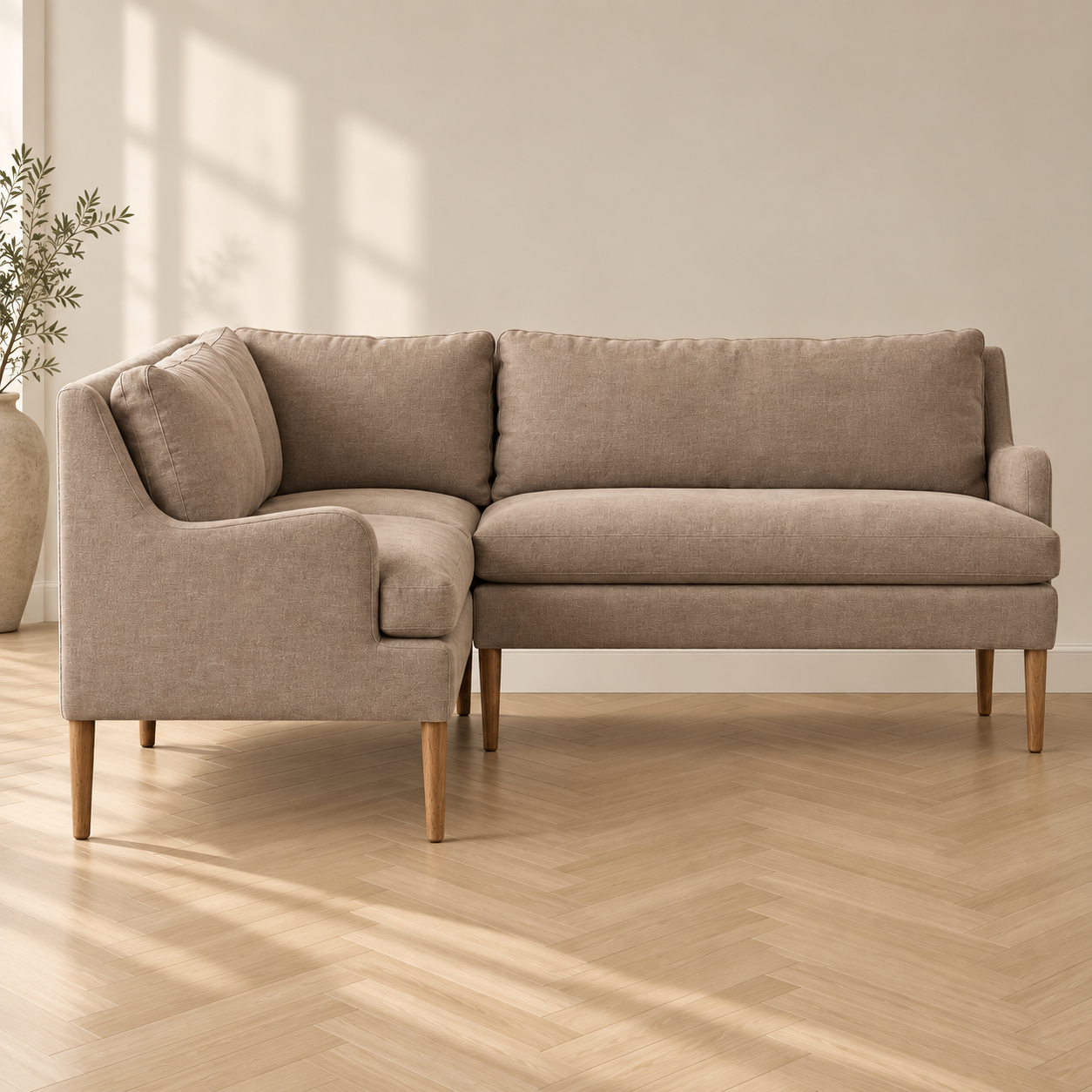 Custom plush linen corner dining bench with overstuffed cushions and wood legs by HF Atelier