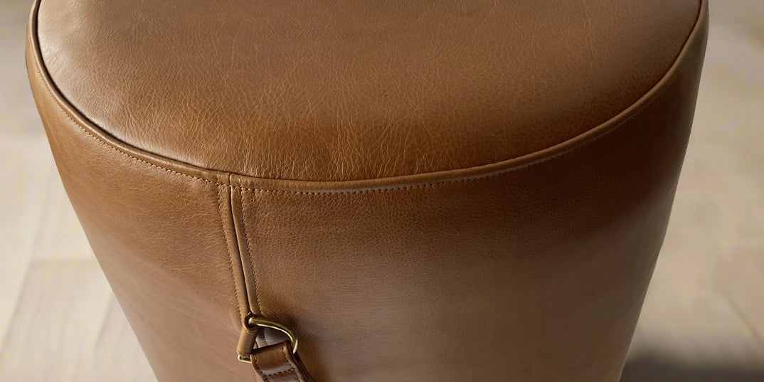 leather-ottoman-with-handle.webp