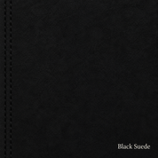 Close-up of black suede fabric with visible stitching.